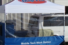 Van in portable paint spray booth
