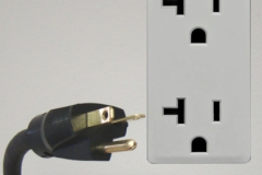 Our 1 1/2 HP Models are supplied with a 115V molded Nema 5-20 Plug.