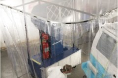 Attached clear curtain enclosure moved with the workstation.